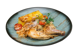 Chicken with gratin and mushroom sauce